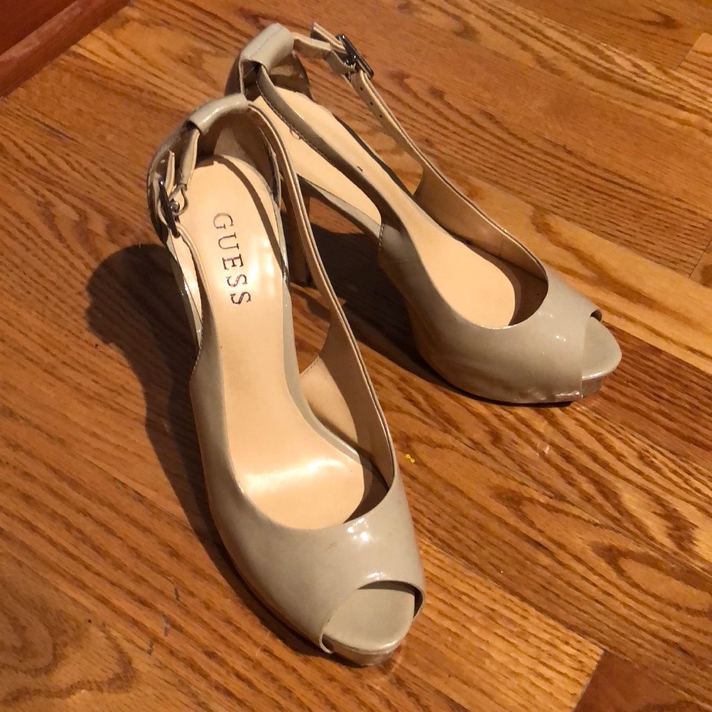 Light nude Guess platform peep toes